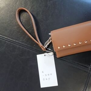 A New Day Tan Wristlet with Gold Accents